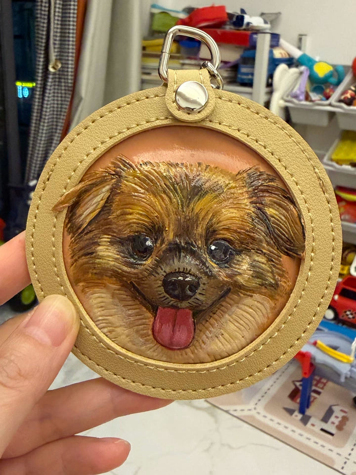 Brown Pomeranian portrait keychain on natural almond leather frame